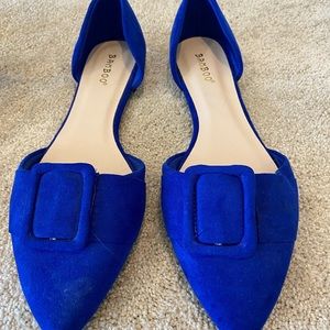 Blue velvet flats with buckle detail. Size 9. Never worn.